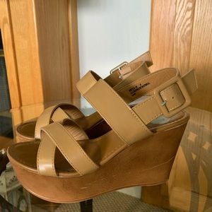 Nude wedge cross-strap heels